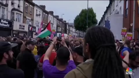 'We will not be divided': U.K. counter-protestors march in solidarity with refugees and migrants