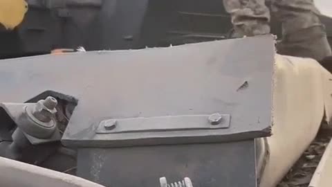 Bandera members from Western Ukraine loot their own looted Ukrainian tank