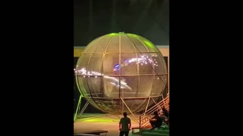 Motorcycle stunt cage accident during performance