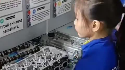 School kids In Japan learning car maintenance