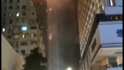 Towering Inferno In Hong Kong, Skyscraper Under Construction Consumed In Flames