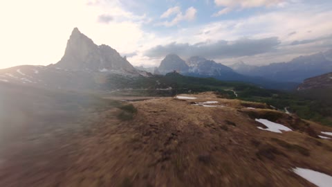 Fast and Acrobatic Drone Flight Over Cinematic Mountains