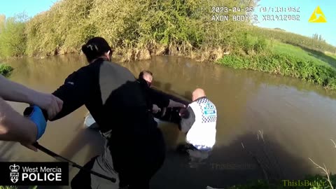 Cops form human chain in desperate race to rescue woman from sinking car in flooded ford