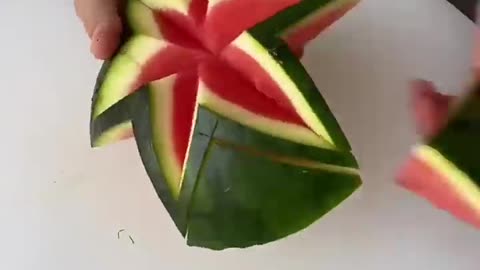 Creative cutting of watermelon to look like an art. So interesting.