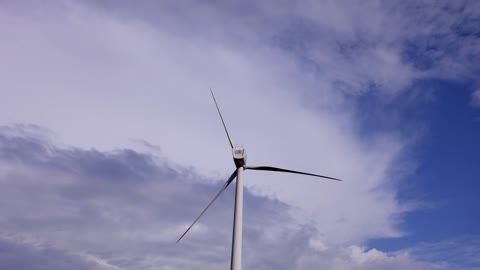 Wind turbine off under a cloudy sky