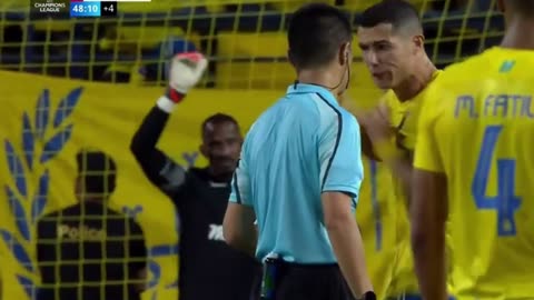 Cristiano Ronaldo furious with referee over a penalty decision.