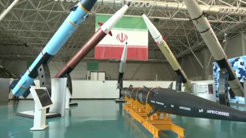 Army Sergei Shoigu gets a close look at Iranian-made missiles and UAVs at an exhibition in Tehran