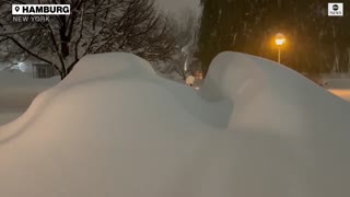 New York resident finds huge snowdrift when he opens garage door