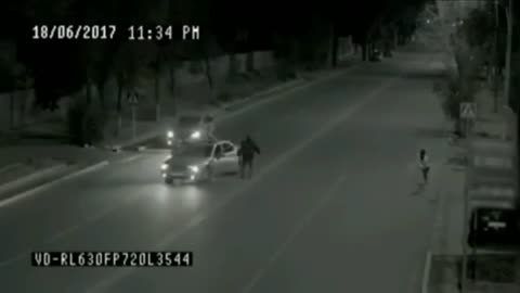VIRAL ...!! "Ghost Man" CCTV footage shows someone saving a young girl's life