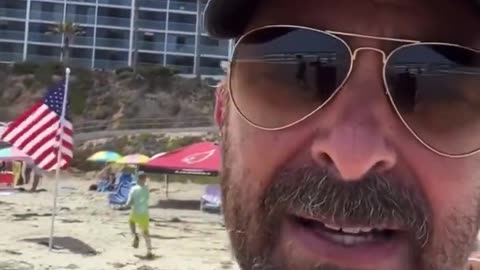 LOL: Lib has unhinged meltdown when he sees American flags at the beach
