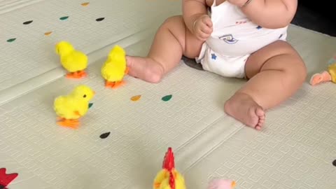 Cute baby playing with colorful chicks | cute babies videos