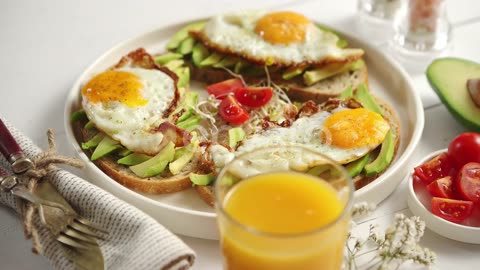 Delicious Healthy Breakfast with Sliced Avocado Sandwiches with Fried Egg