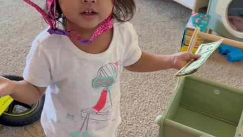 Little Girl Learns About Inflation During Playtime