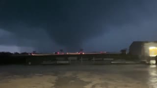 Incredible footage shows possible tornado, lightning flashes