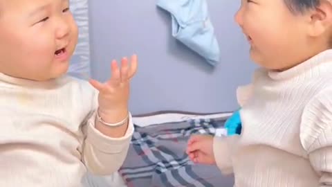 Cute babies fight