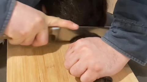 cutting a child's hair using a knife 😱