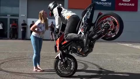 Surprise KTM stunt show with stoppie