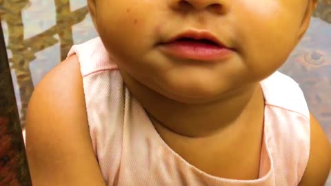 Cute Baby Enjoying the Raining