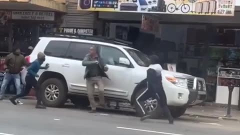 Third World Justice: Old Man Stops His Car From Being Jacked