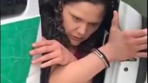 ALLEGED HUMAN SMUGGLER APPEARS POSSESSED BY DEMONS AS BORDER PATROL DETAINS HER