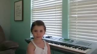 Triniti Singing Let God Arise on the Piano