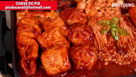 KOREAN WOMAN EATING Noodles With Spicy Seafood