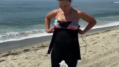 How do you take off a wetsuit if you're a girl?