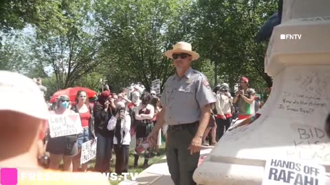 Police getting items THROWN at him at HAMAS rally