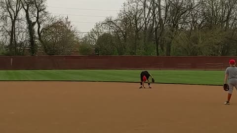 Boy Hilariously Struggles to Catch Ball While Playing Baseball