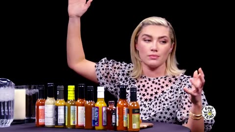 Florence Pugh Sweats From Her Eyebrows While Eating Spicy Wings Hot Ones.mp4