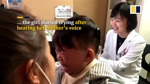 Chinese baby girl cries after hearing sound for the first time