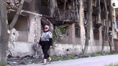 Rescuers inspect destroyed Mariupol buildings
