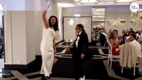 Bridesmaid and groomsman surprise audience with hilarious outfit swap during reception