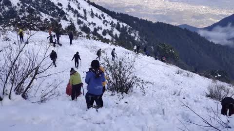 People enjoying snow.