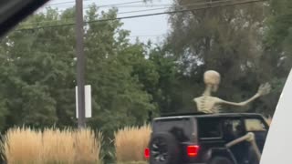 Giant Skeleton Rides in Backseat