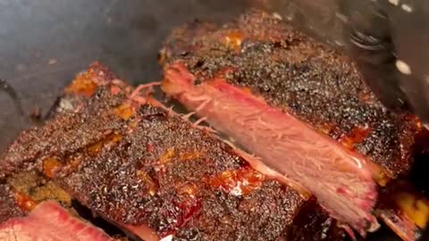The biggest beef ribs in Las Vegas are from Rollin Smoke