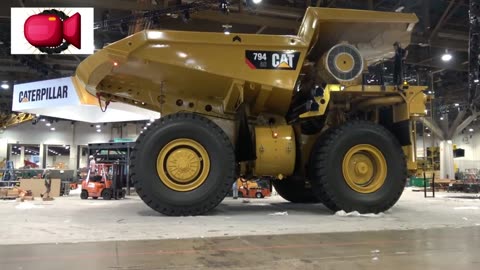 Moving a massive Caterpillar 794AC dump truck