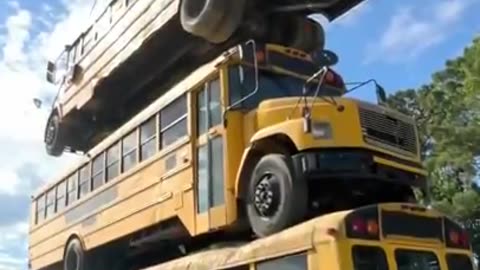 How many school buses can we stack?