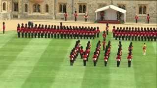 King Charles III welcomes President Biden with honor guard inspection