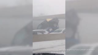 Snow-covered Ohio interstate pile-up wrecks dozens of vehicles