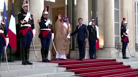 Macron, Mohammed bin Salman shake hands in Paris