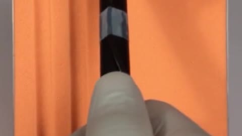 Draw a row of vertical lines on the foam