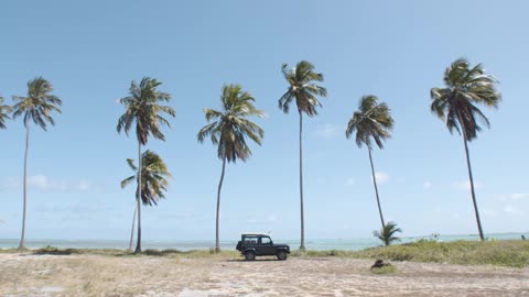 Land Rover parked in the beach