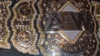 AEW Heavyweight championship replica re-stoned by Rafford designs