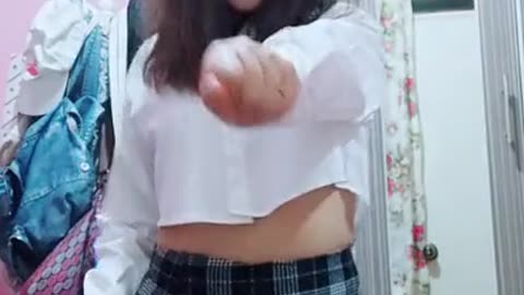 girl dancing in school uniform