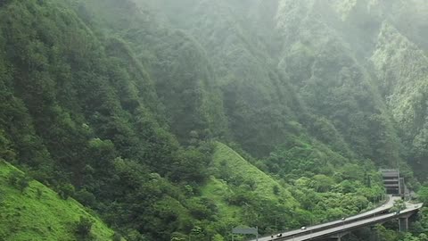 An Elevated Highway In The Mountain Valley In Hawaii