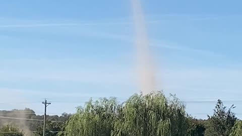 Dust Devil Hits Dairy Farm