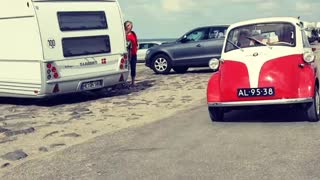 Old Car Rolling At The Beach