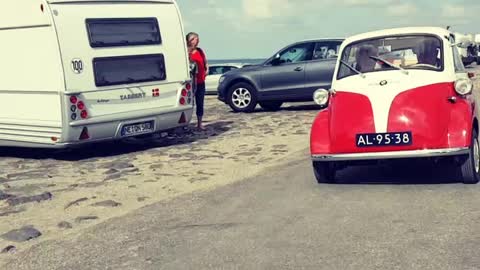 Old Car Rolling At The Beach