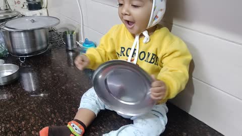 Baby in kitchen 😂